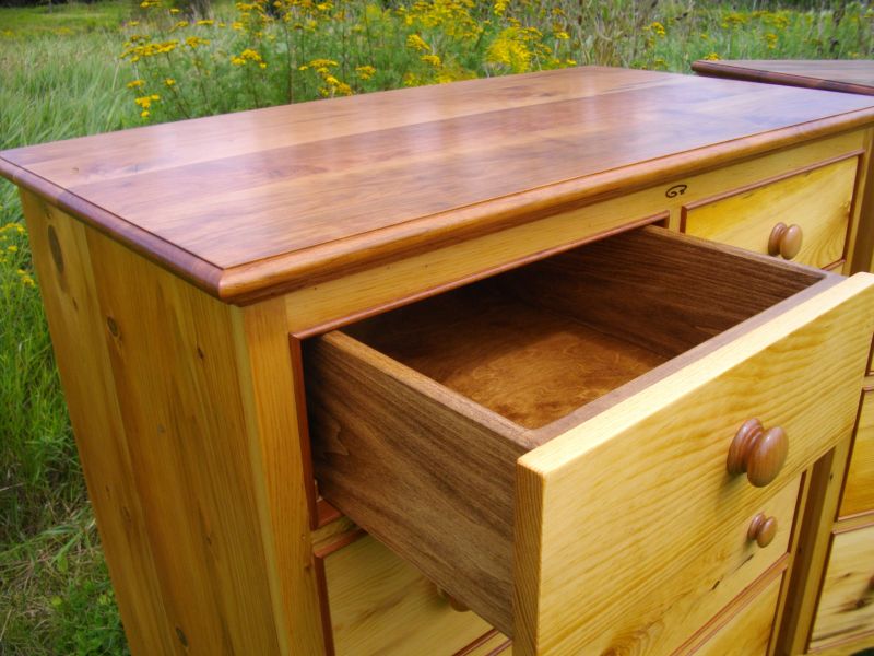 Detail of solid wood dresser drawer.
