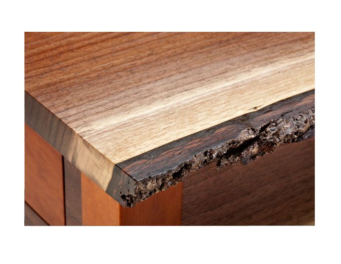 Bark edge on art table. Ontario custom furniture.